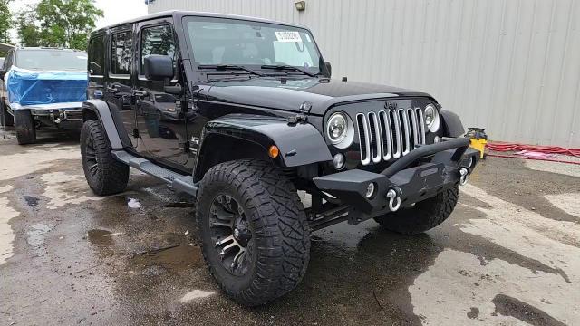 2016 Jeep Wrangler Unlimited Sahara - zdjęcie 13