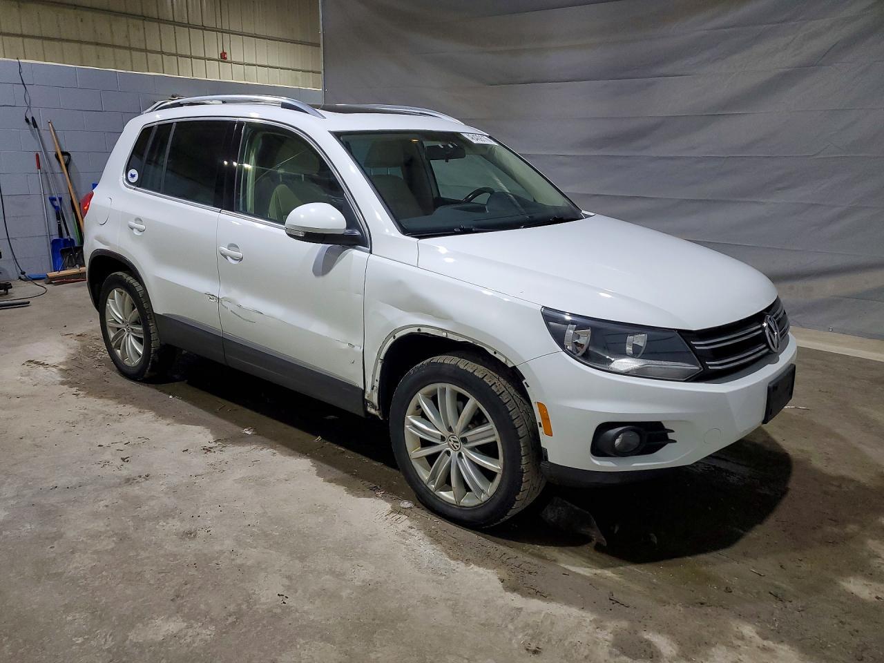 2014 Volkswagen Tiguan S - zdjęcie 4