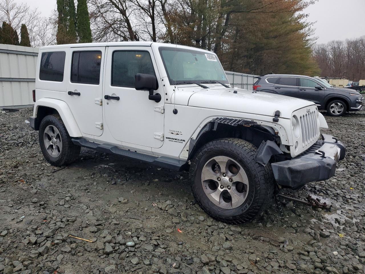 2016 Jeep Wrangler Unlimited Sahara - zdjęcie 4