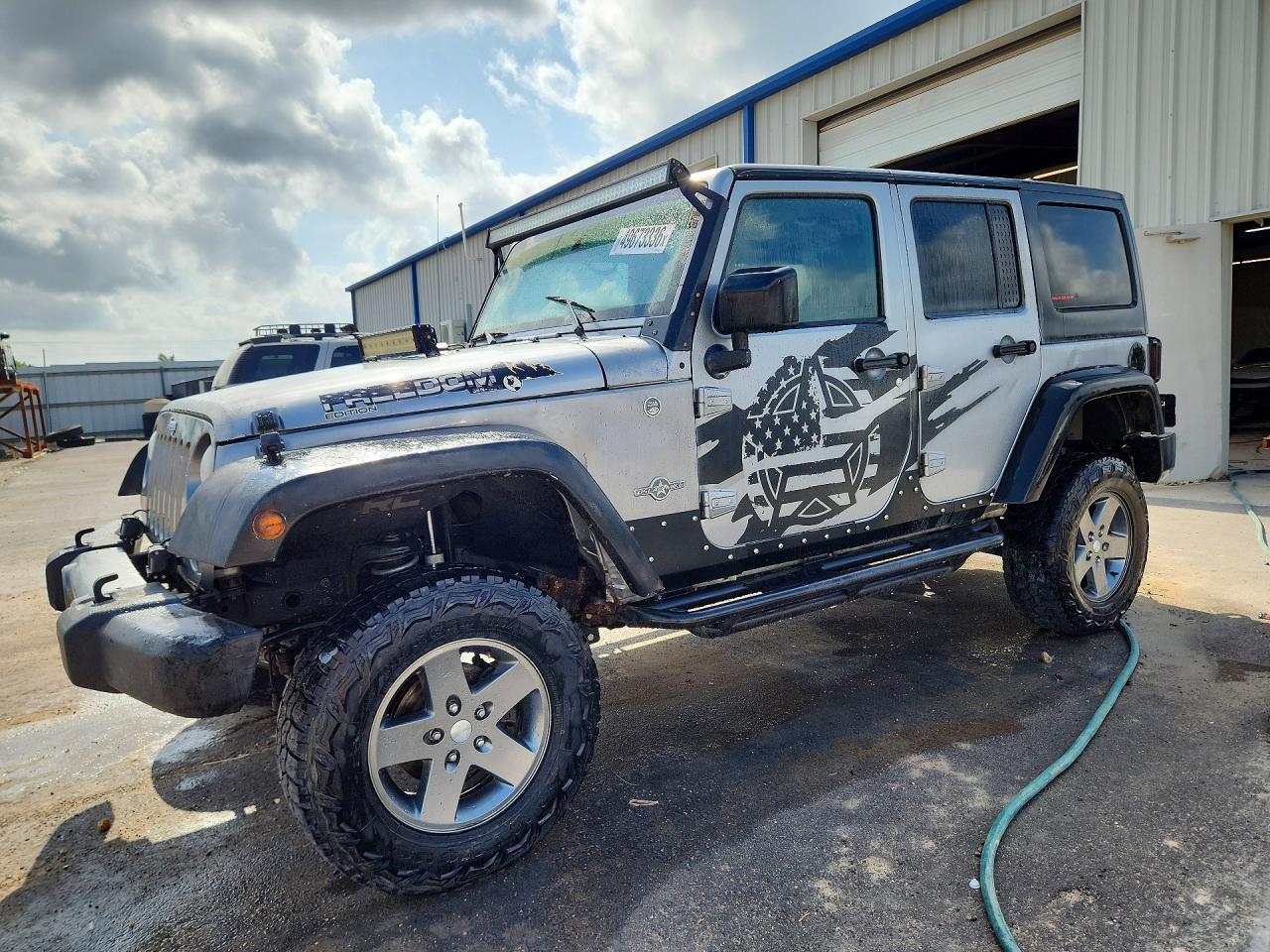 2013 Jeep Wrangler Unlimited Sport - zdjęcie główne