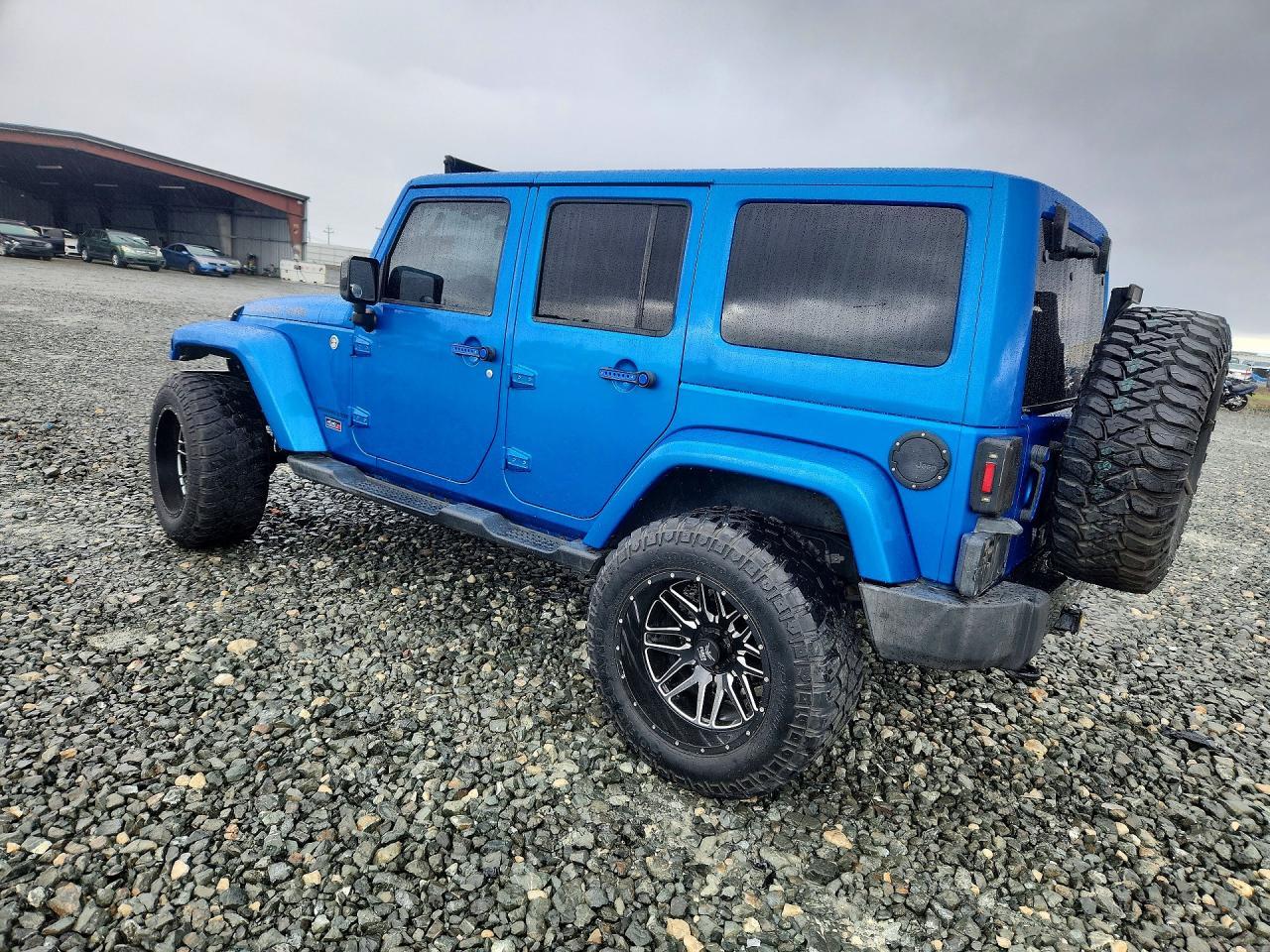 2014 Jeep Wrangler Unlimited Sahara - zdjęcie 2