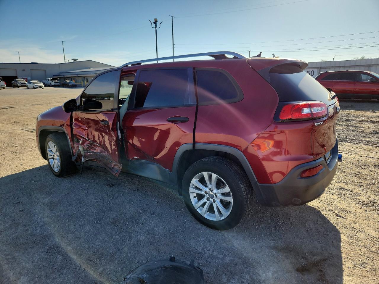 2015 Jeep Cherokee Sport - zdjęcie 2