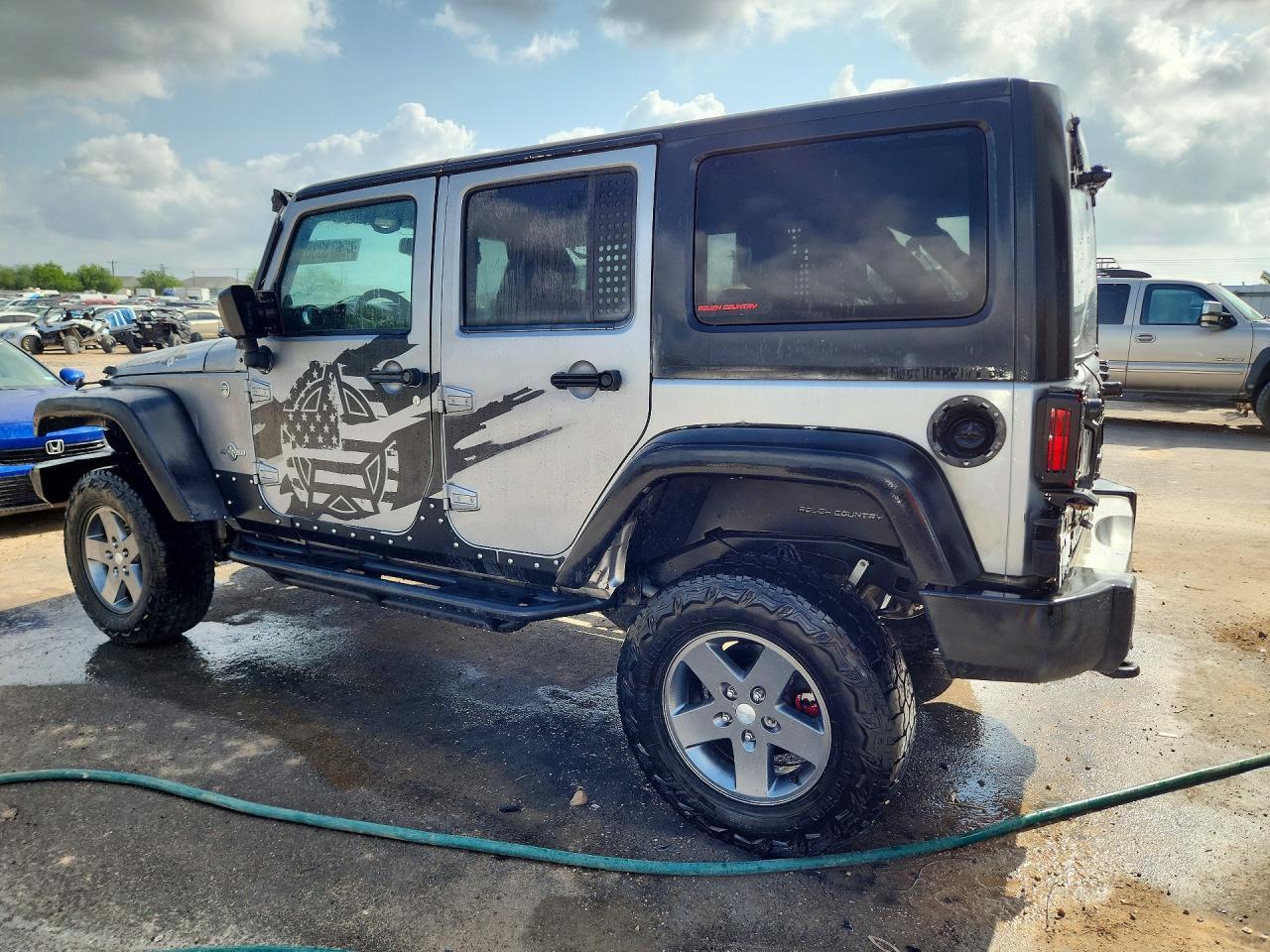 2013 Jeep Wrangler Unlimited Sport - zdjęcie 2
