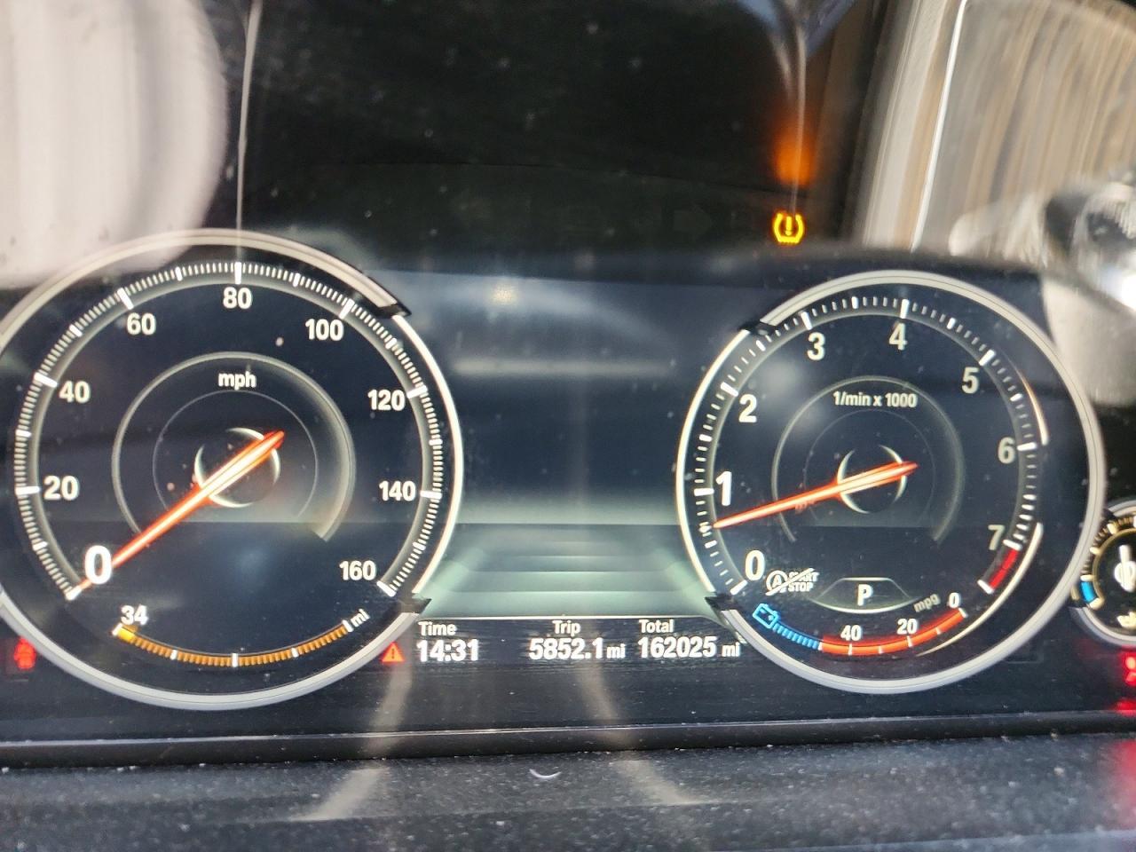 2015 BMW Seria 7 740Li - zdjęcie 9