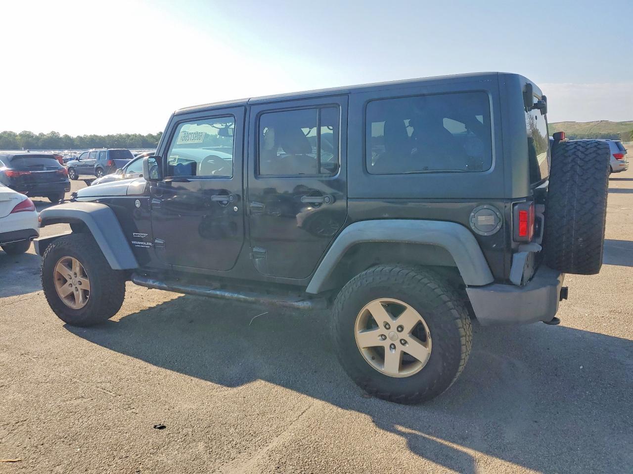 2013 Jeep Wrangler Unlimited Sport - zdjęcie 2