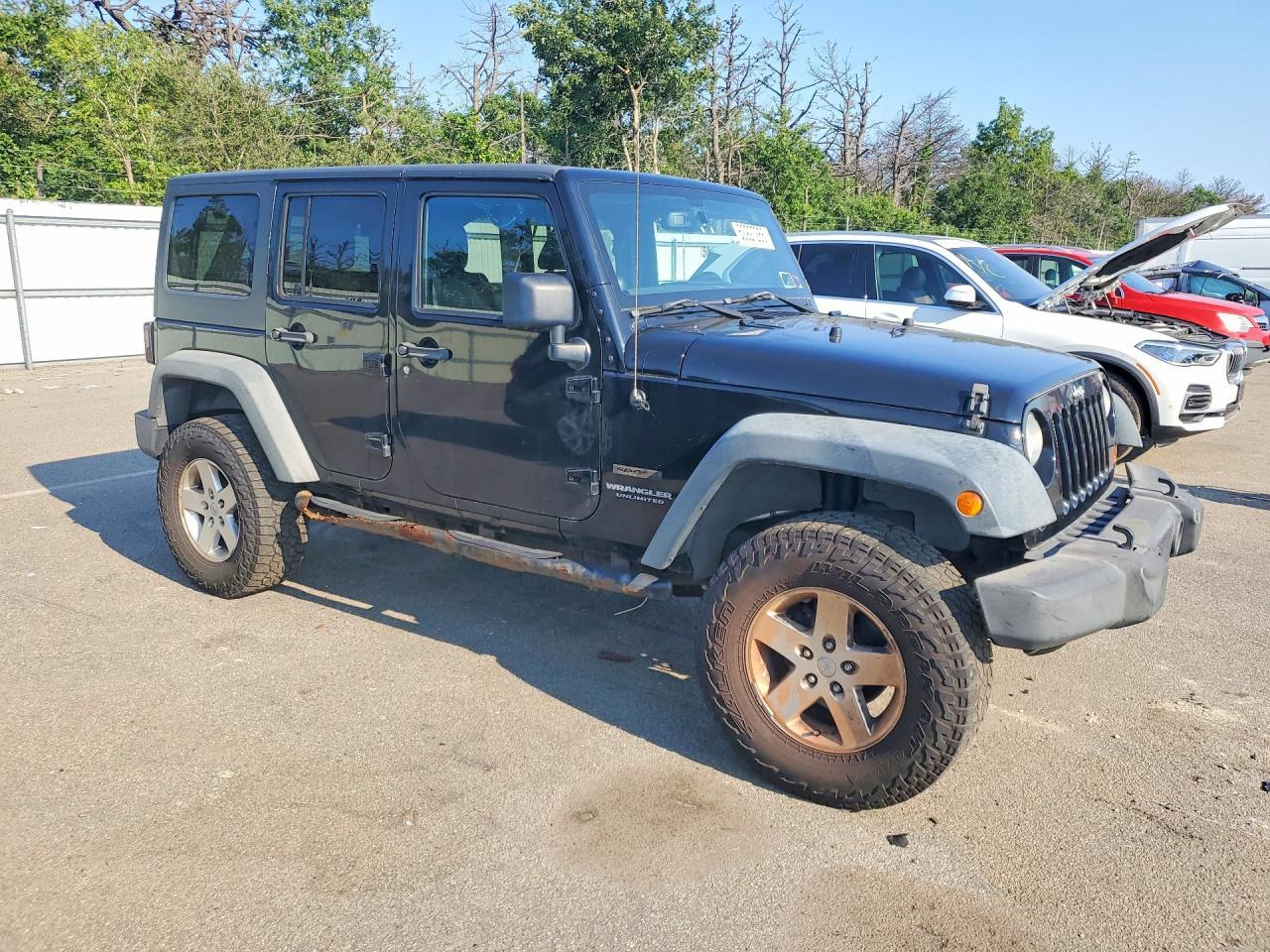 2013 Jeep Wrangler Unlimited Sport - zdjęcie 4