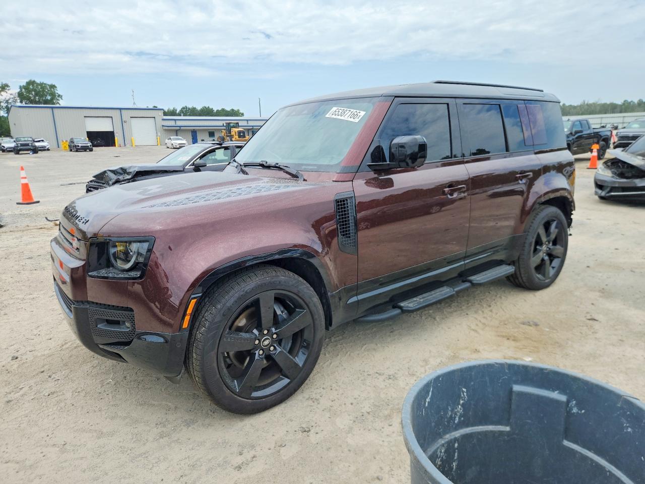 2025 Land Rover Defender 110 Sedona Red - zdjęcie główne